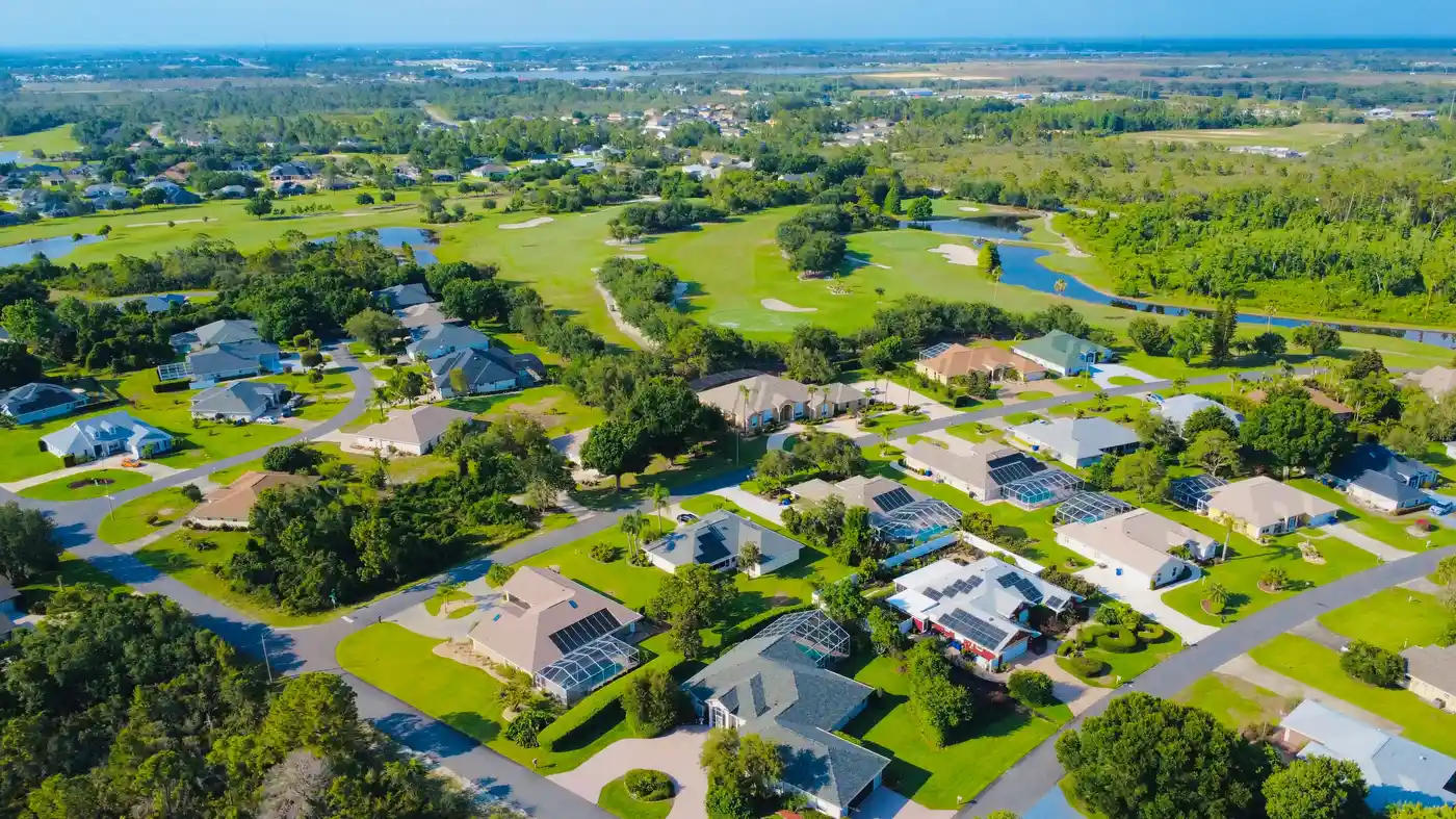 Aerial view of a suburban Orlando neighborhood with green landscaping